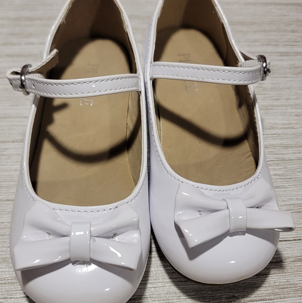 White children's shoes